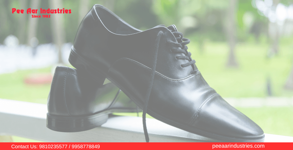 Pee Aar Industries black formal leather shoes with brand logo and contact details displayed