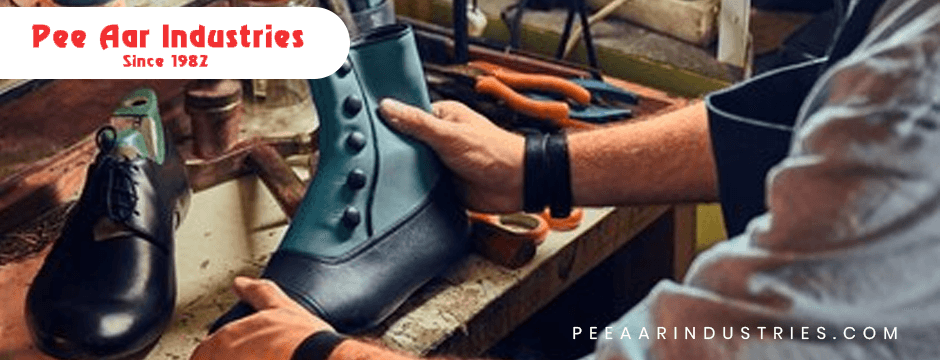 Slipper Manufacturing Company Creating Durable Everyday Footwear 1 Worker inspecting footwear during slipper manufacturing process at Pee Aar Industries factory.